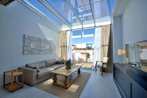 El Armador Casa Palacio by Luxury Suites Cádiz tesisinde bir oturma alanı