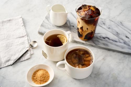 a table with two cups of coffee and a drink at Residence Inn by Marriott Harrisburg Carlisle in Carlisle