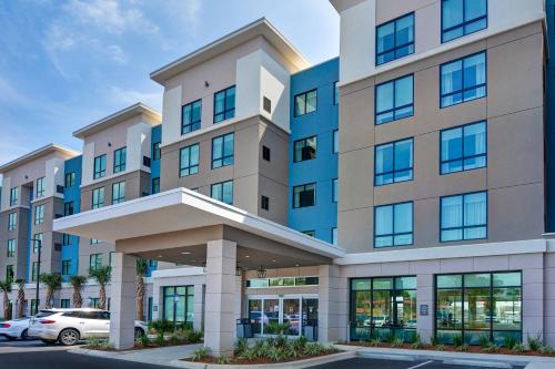 a rendering of a building with a parking lot at Residence Inn by Marriott Fort Walton Beach in Fort Walton Beach