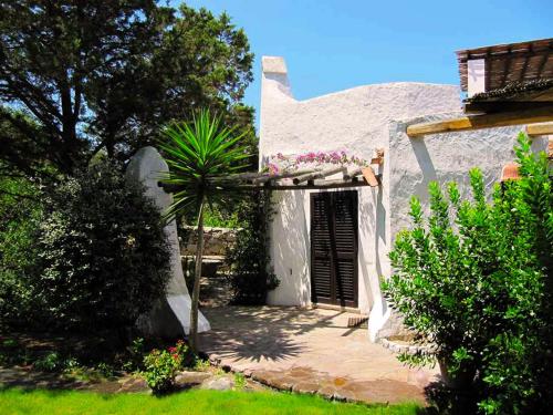 A garden outside Private Villa ORIONE