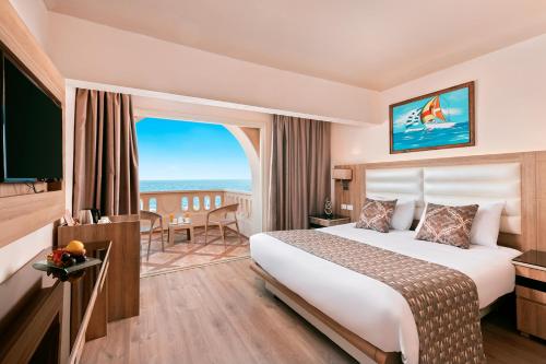 Voodi või voodid majutusasutuse Pickalbatros Citadel Resort Sahl Hasheesh toas