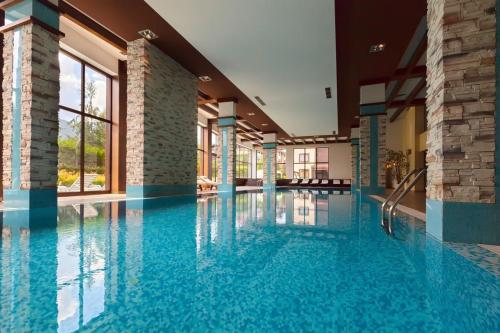 Басейн в или близо до Pirin Bliss Apartment Ski, Spa and Relax at Terra Complex