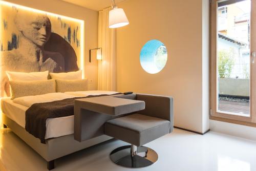 Cama ou camas em um quarto em Nala Individuellhotel