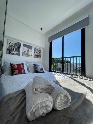 Tempat tidur dalam kamar di LOFT 08 Londres