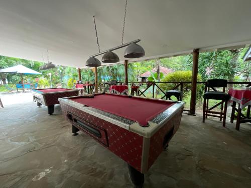 a pool table in the middle of a room at Maasai Koroga in Mombasa