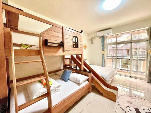 Кровать или кровати в номере Banshan Yunxiu Homestay