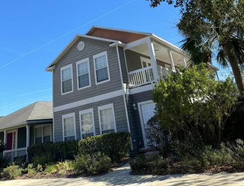 a house with a porch on top of it at A stylish and Comfy Place to Stay in Gainesville