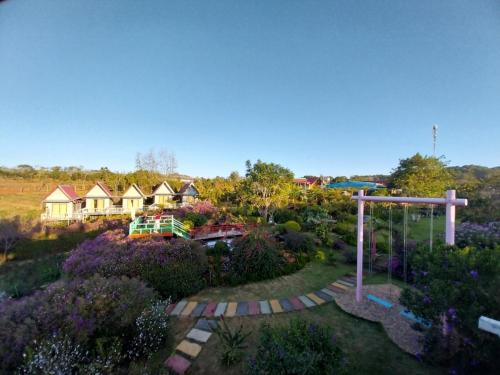 an overhead view of a house with a garden at K'Ho Cil Homestay Tà Nung in Da Lat