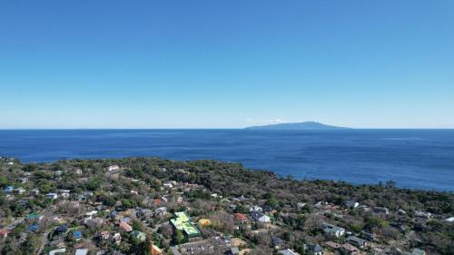 an aerial view of a city and the ocean at Izu Kogen Ocean Resort, Ito Villa-TOKI- in Ito