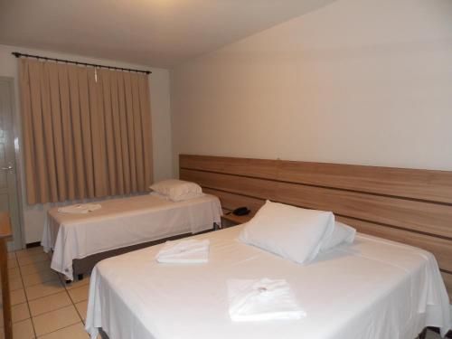 Uma cama ou camas num quarto em Hotel Mattes