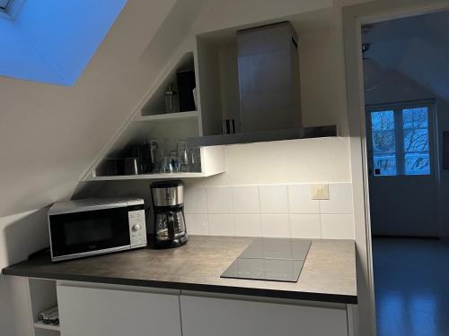 Dapur atau dapur kecil di Lyxiga hem mitt i Gamla Viken, hög standard