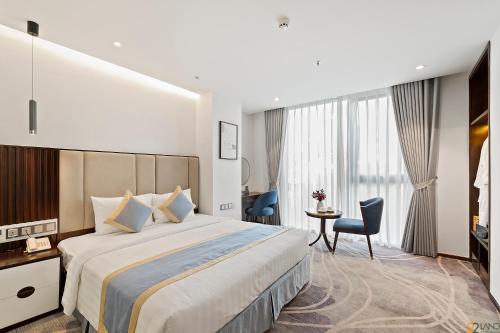 22Land Hotel Premium Saigon房間的床