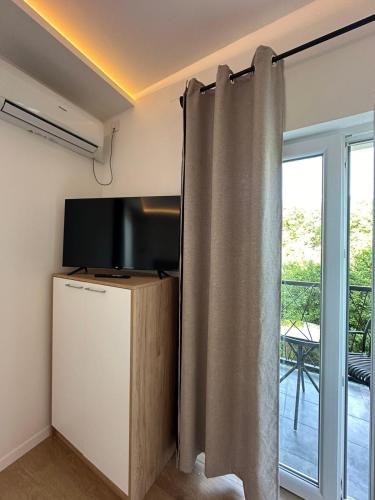 TV/trung tâm giải trí tại Apartman Igor