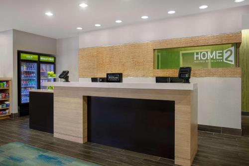 a lobby of a home store at Home2 Suites By Hilton Gainesville in Gainesville