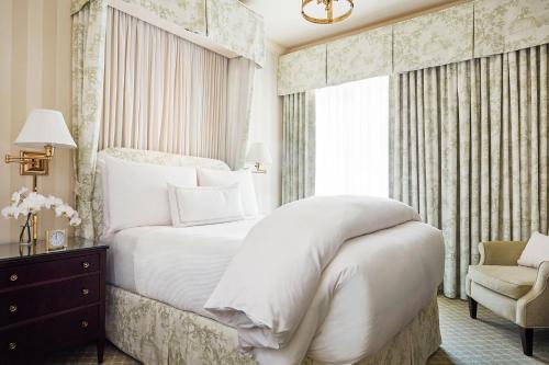 A bed or beds in a room at The Hay - Adams