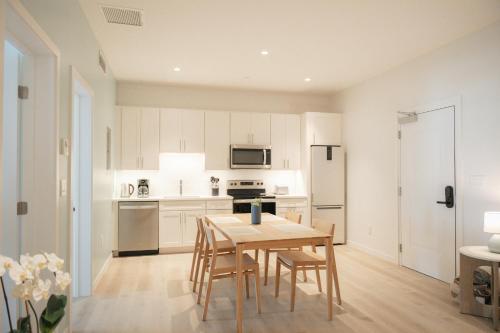 A kitchen or kitchenette at Governors Village - 1,2,3 & 4 Bedroom Apartments on Seven Mile Beach Corridor