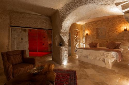 Kama o mga kama sa kuwarto sa Harem Suites Cappadocia