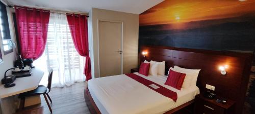 Кровать или кровати в номере Tulip Inn Sainte Clotilde, La Réunion