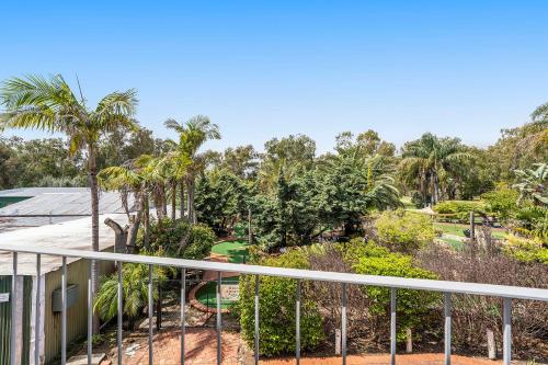 A balcony or terrace at The Swan Valley Hotel