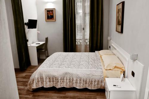 Una cama o camas en una habitación de Flaneur