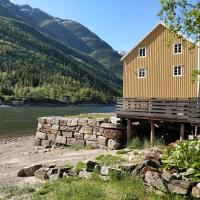 Viesnīca Sjøgata Riverside Rental and Salmon Fishing pilsētā Mūšēene