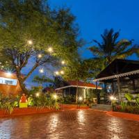 TT Beach Cottages – hotel w mieście Candolim