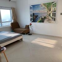 Warm Seaside Guesthouse, hotel en Al Khan, Sharjah