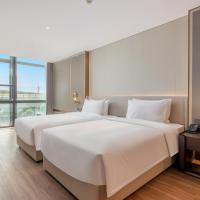 Madison Hotel Shenzhen Bao'an Airport, hotel perto de Aeroporto Internacional de Shenzen - Bao'an - SZX, Shenzhen