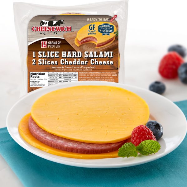 Appetizing picture of Cheddar Cheesewich™ on plate and image of packaged product in background.