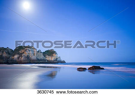 Stock Image of Praia dos Tres Irmaos at night, Alvor, Algarve.