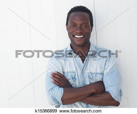 Stock Photograph of Portrait of a handsome black man with arms.