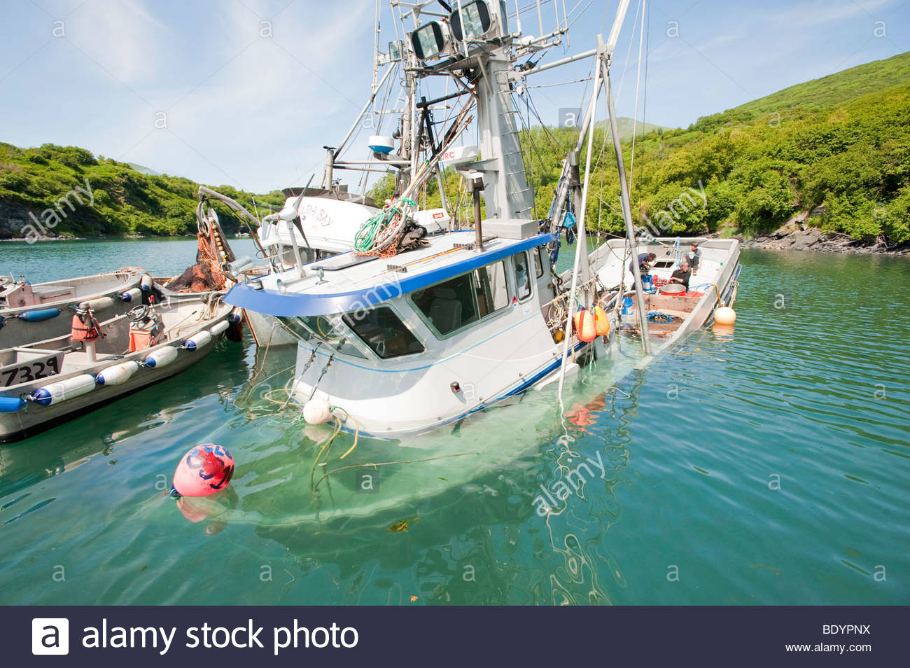 Sinking Fishing Boat Stock Photos & Sinking Fishing Boat Stock.