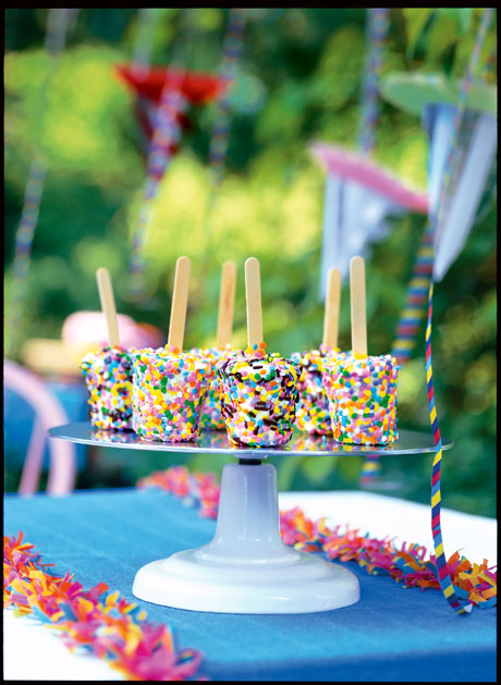 Beneath the confetti-candy covering of these ice cream pops lies a marvelous surprise: a soft-in-the-center miniature candy bar on a Popsicle stick. Get the recipe. 