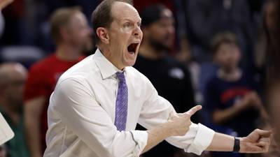 Washington to bring back coach Mike Hopkins for 7th season