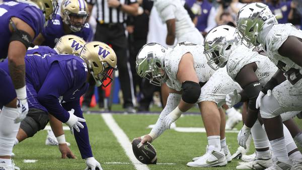 No. 3 Washington rallies to beat No. 5 Oregon 34-31 and secure playoff spot