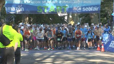 Runners, parade-goers enjoy festivities despite heat