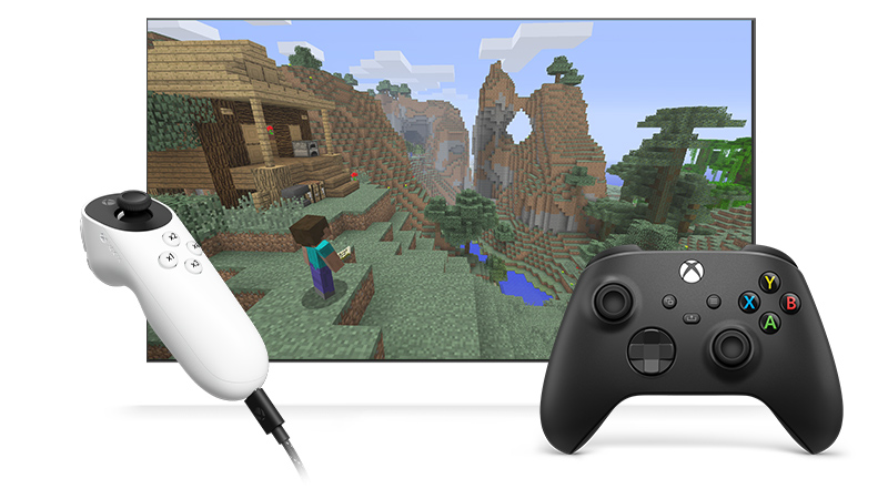 Two controllers, one a Xbox Wireless Controller and the other an Xbox Adaptive Joystick linked together with Xbox Controller Assist to play Minecraft.