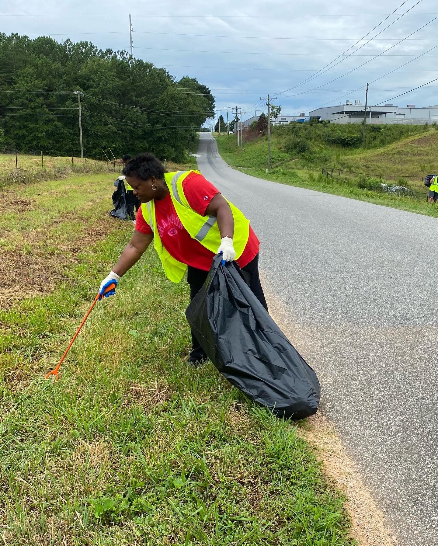 people picking up litter