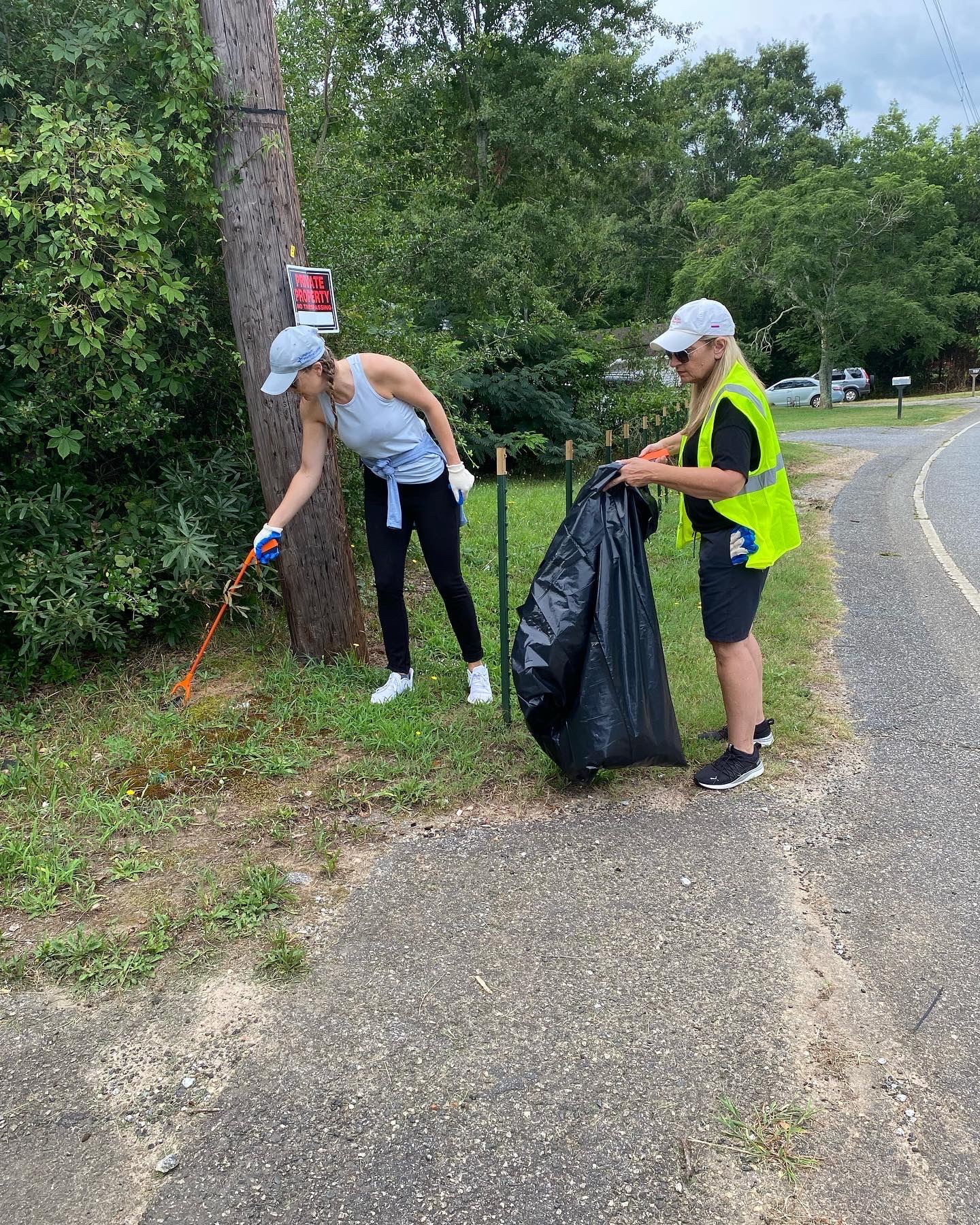 people picking up litter