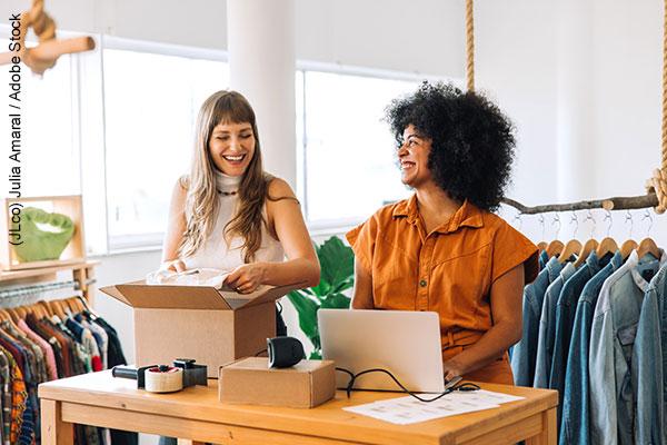 Online store owners working together in their shop