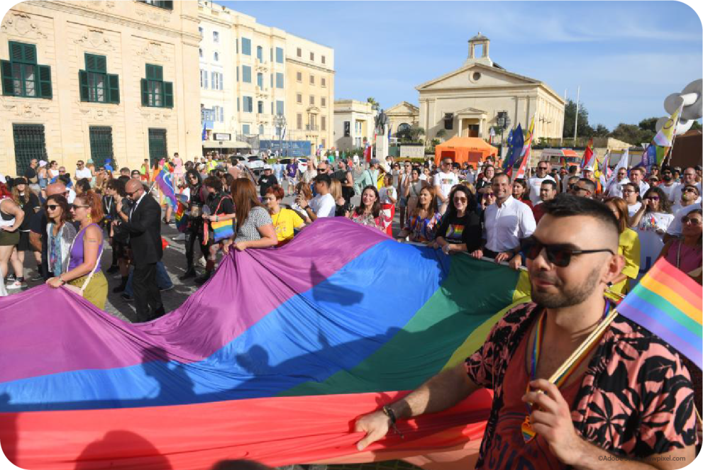 people demonstrating to show support for the LGBTIQ people including Commissioner Helena Dalli