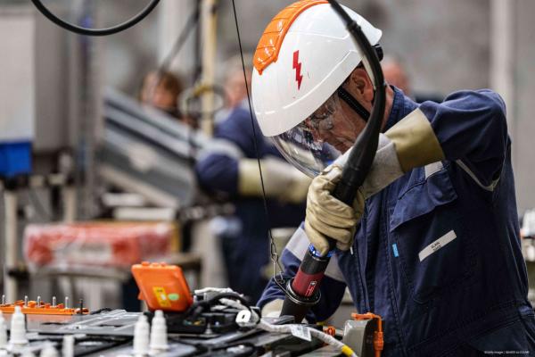 An operator works at the battery workshop of the Stellantis cars factory in Hordain, northern France