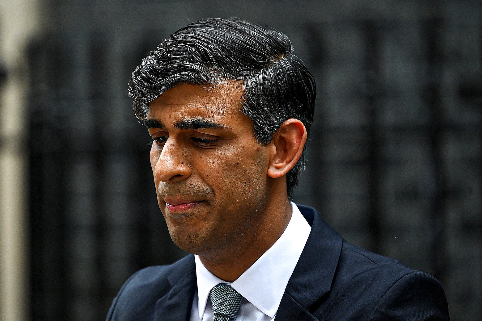 Britain's outgoing Prime Minister and leader of the Conservative party, Risihi Sunak, delivers a statement after his general election defeat, outside 10 Downing Street in London on Friday.