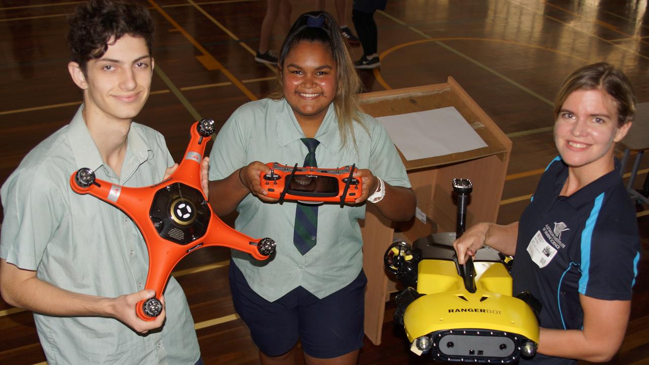 Townsville State High School students Jonas Gibson, 17, and Jameliah Illin, 15, with engineer and STEM Star Melanie Olsen.