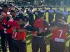 Little River and Manifold Heights cricketers link arms following the death of Sharks player Jayme Sykes. Picture: Little River Redbacks.