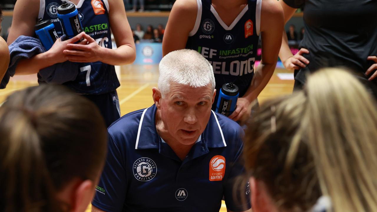 GEELONG, AUSTRALIA - OCTOBER 30: Chris Lucas, Head Coach of Geelong United speaks to players during the round one WNBL match between Geelong United and Townsville Fire at The Geelong Arena, on October 30, 2024, in Geelong, Australia. (Photo by Kelly Defina/Getty Images)