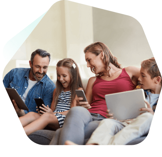 Family at home using their devices 