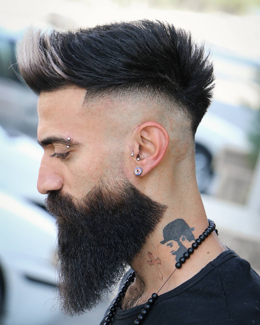 Pompadour Mohawk with Bald Fade