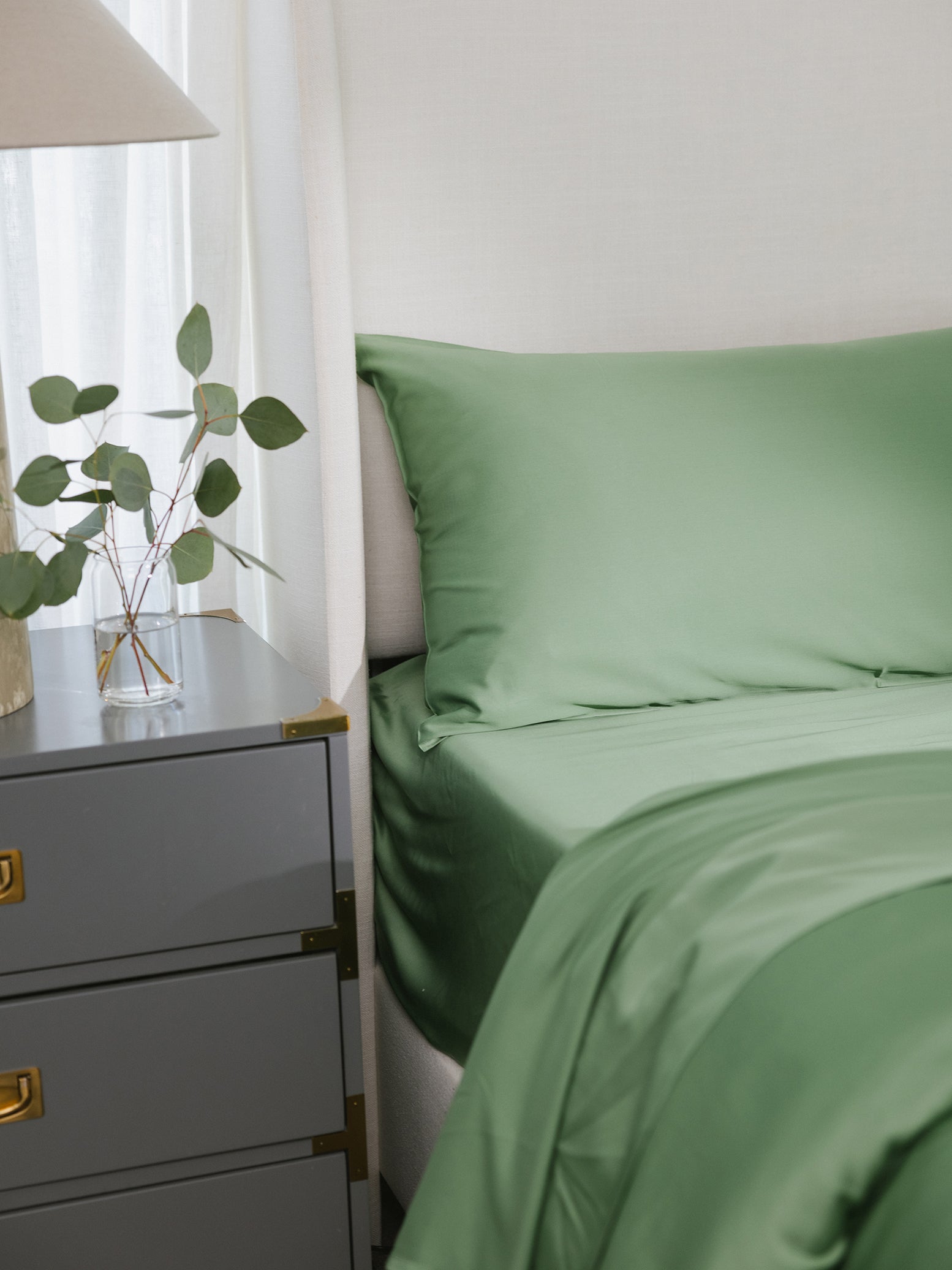 Close shot of fern colored bedding 