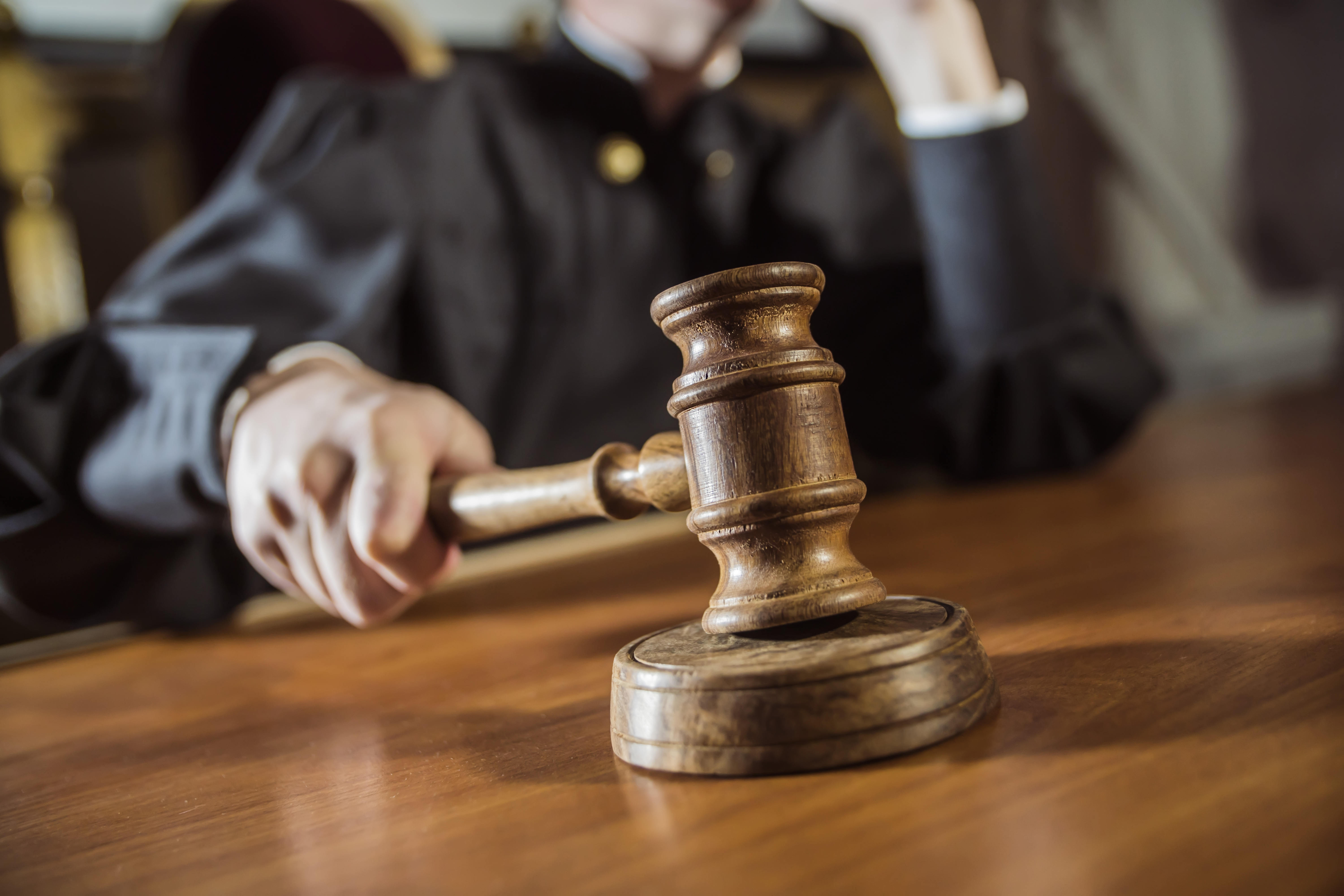 Judge with gavel | Adobe Stock Photo